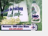 Omo Lilas Blanc et Carrefour : Affiche 4x3 destine aux stations de mtro pour un bidon de lessive Omo