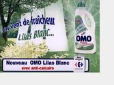 Omo Lilas Blanc et Carrefour : Affiche 4x3 destinée aux stations de métro pour un bidon de lessive Omo